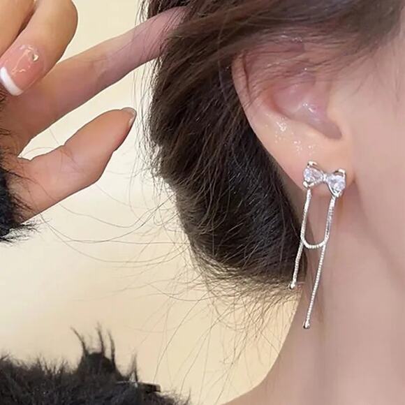 Bow Dangle Drop Earrings Silvertone Best Seller - Picture 1 of 4